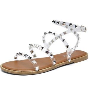 Flat travel sandals. Clear w/ studs
